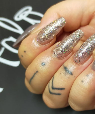 Long, silver glitter nail design using the Halo gel polish shade 'Frosty'