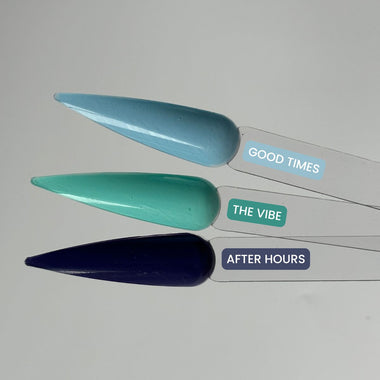 Three nail tips in blue, green, and black with 'Good Times', 'The Vibe', and 'After Hours' labels on a gray background.