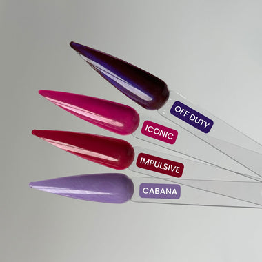 Nail art tips with color labels on a gray background