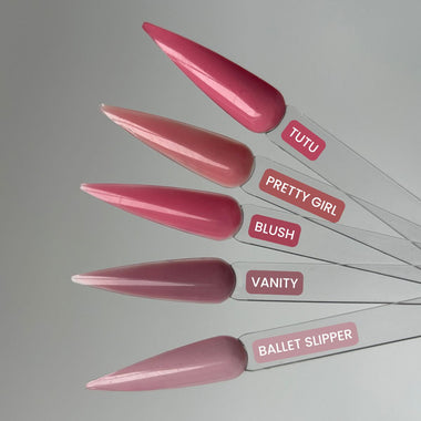 Set of pink nail extensions with labeled names on a gray background