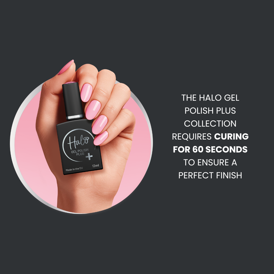 Hand holding a black Halo gel polish bottle with pink nails on a dark background