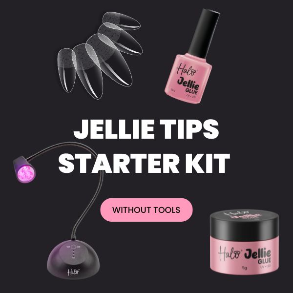 Jellie Tips Starter Kit with nail glue, lamp, and gel on a black background