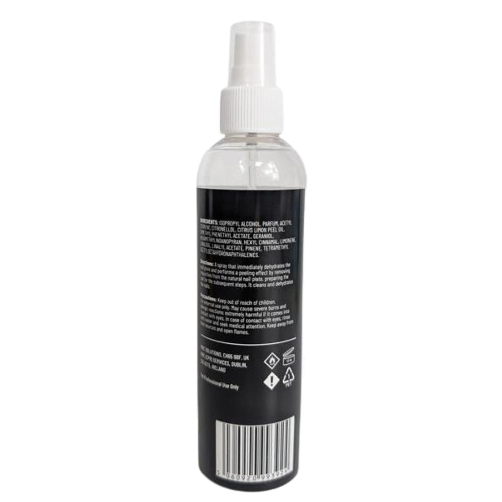 Clear spray bottle with black label on a white background