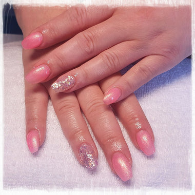 Long glitter and sparkle nail set using the Halo gel polish shade 'Pink Shimmer' 