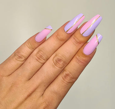 Long square nails with pink, purple and gold nail art