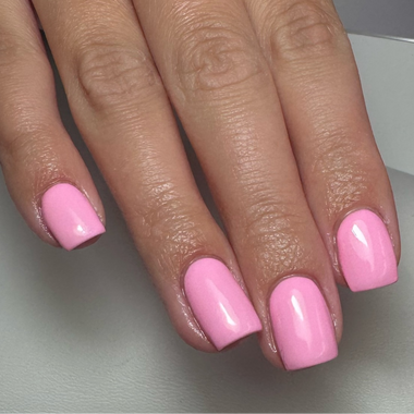 Hand with pink nail polish on a neutral background - Bubblegum Pink Halo Gel POLISH