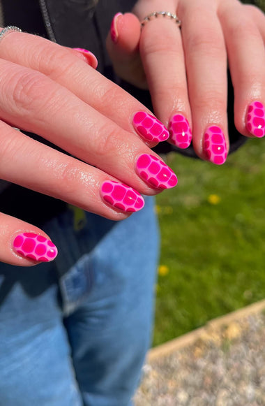 Pink pebble nail art using the Halo Gel Polish shade 'Cerise'
