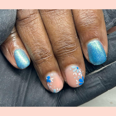 Blue flower nail design using Pure Nails' Halo gel polish in shade 'Lagoon'