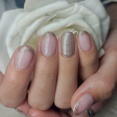 Short, silver French tip nail art using the Halo gel polish shade 'Frosty'