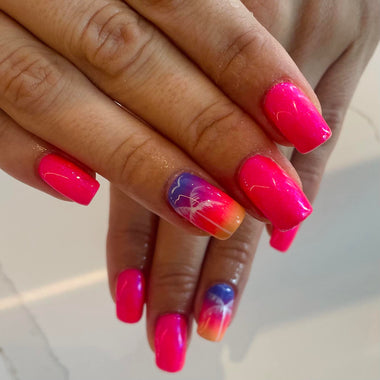 Colourful sunset nail art design using shade 'Mardi Gras' from the Halo gel polish collection