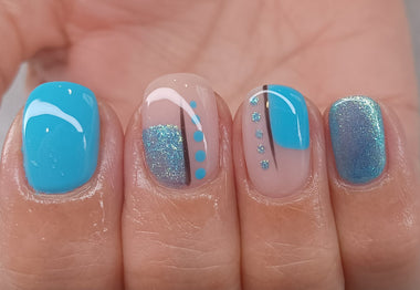 Blue spotted nail design using Pure Nails' Halo gel polish in shade 'Lagoon'