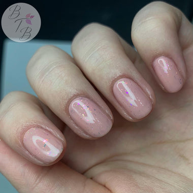 Simple nude glitter nail design using the Halo gel polish shade 'Fairy Dust' 