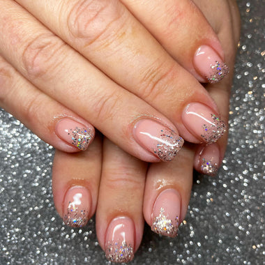 Glitter French tip nail design using the Halo gel polish shade 'Frosty'