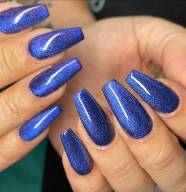 Blue glittery nail set using the Halo gel polish shade 'Navy'