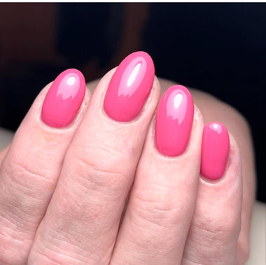 Short, squoval pink nail set using the Halo gel polish shade 'Rose'