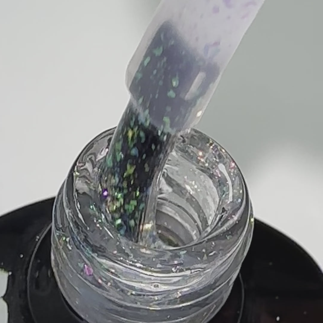 Product video showcasing Pure Nails' HEMA-Free Halo glitter gel polish shade 'Fairy Dust'