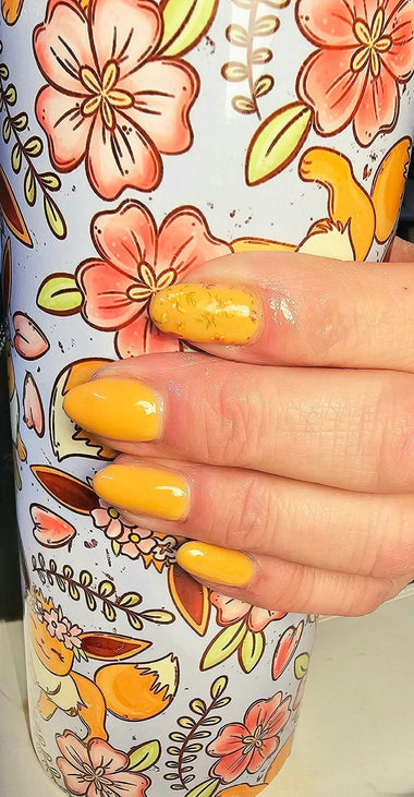 Yellow and gold fleck nail design using Pure Nails' Halo HEMA-Free builder gel in shade 'Strudel' 