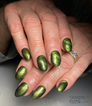 Professional green glitter nail design using the Halo gel polish shade 'Potion' 