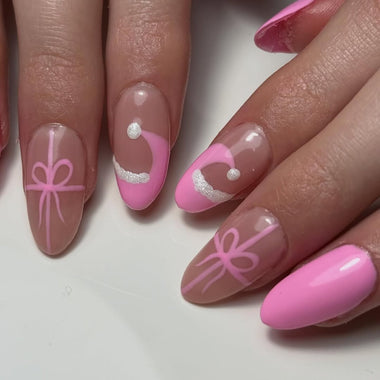 Nails with pink and white designs on a white background - Bubblegum Pink Halo Gel POLISH