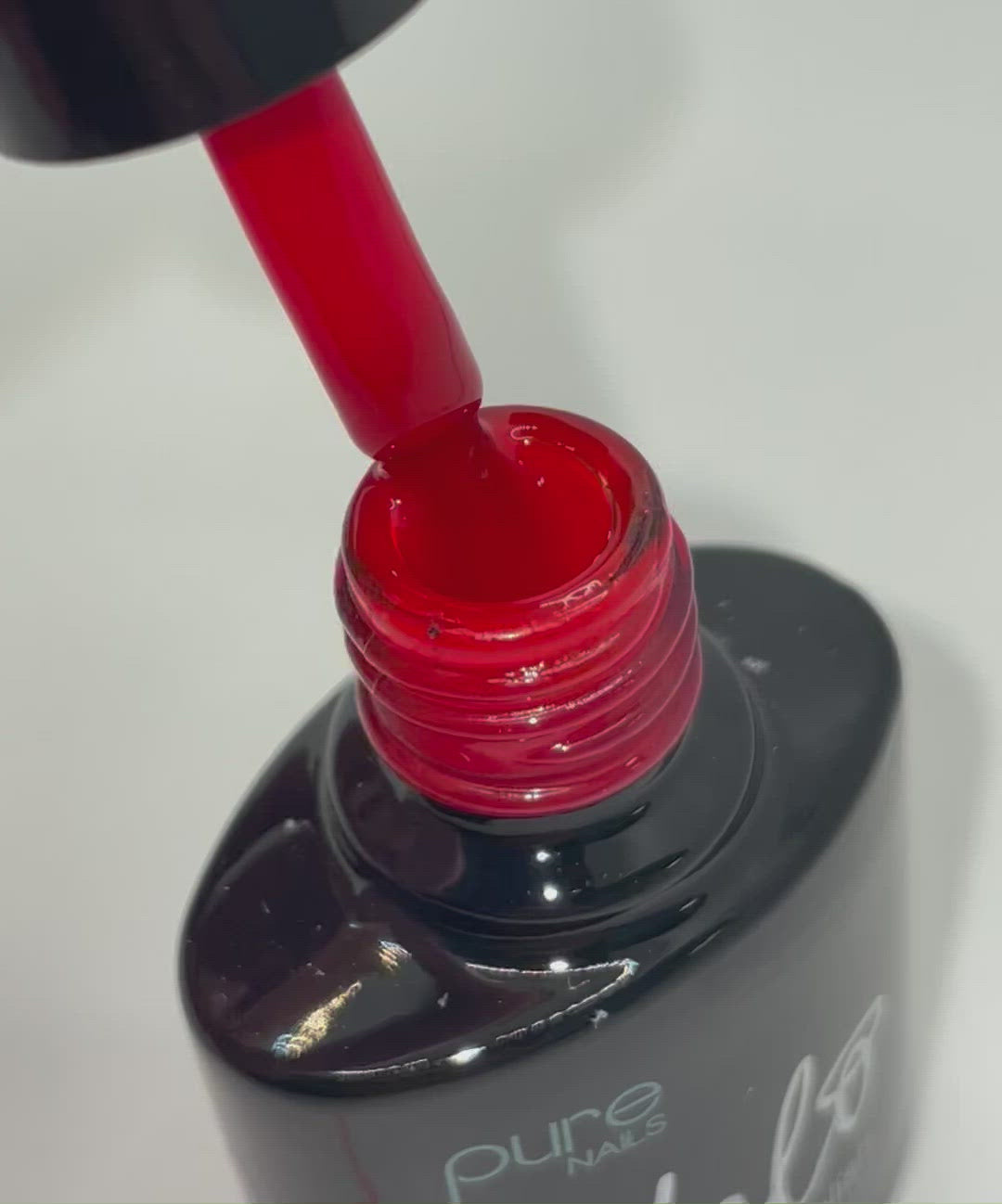 Product video of Pure Nail's Halo gel nail polish in shade 'Apple Red' 